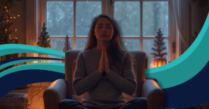 Person practicing mindful breathing by a window with holiday lights, candles, and winter scenery, symbolizing calm, relaxation, and nervous system regulation during the holidays.
